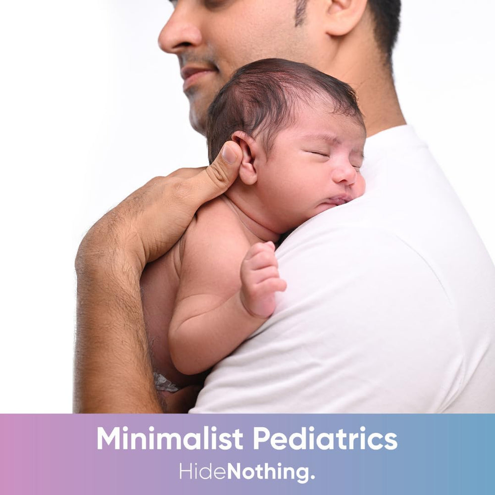 Minimalist Baby Gentle Head to Toe Wash visible foaming lather during bath.