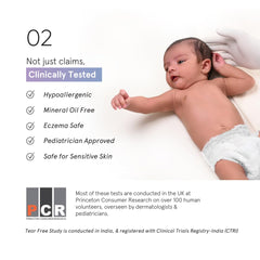 Minimalist baby massage oil applied on baby arm for soothing massage