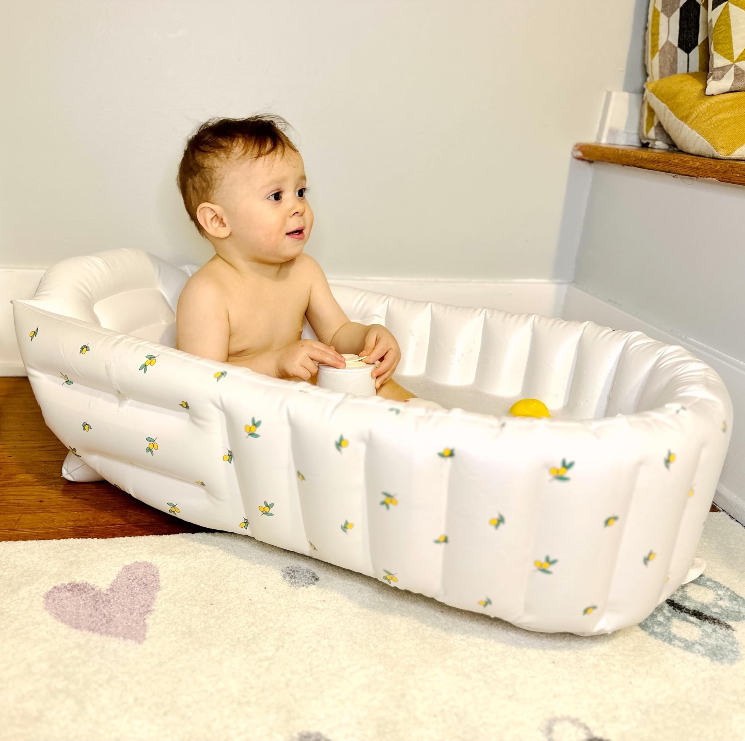 Mink inflatable bath tub Olive multi-use versatility for beach, camping, and playtime.