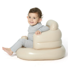 Mink inflatable baby seat khaki built-in pump in action during inflation.