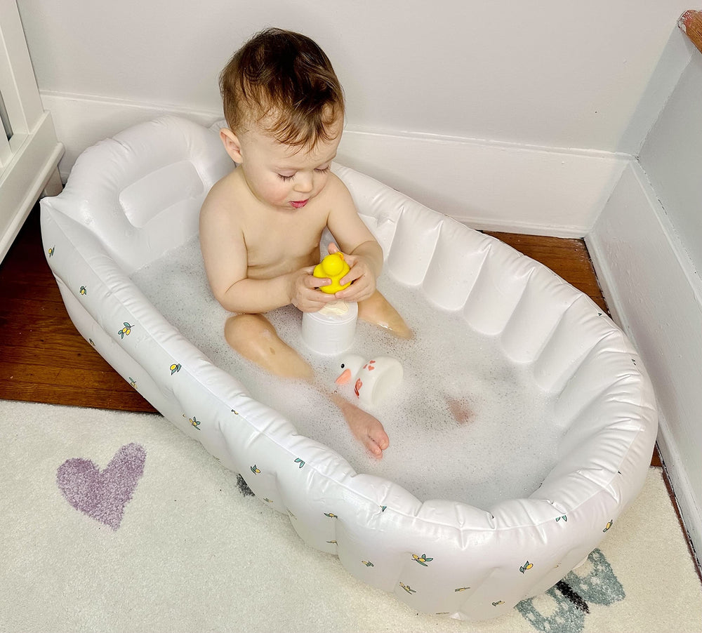 MINK bathtub in use during bath time showing a compact portable setup