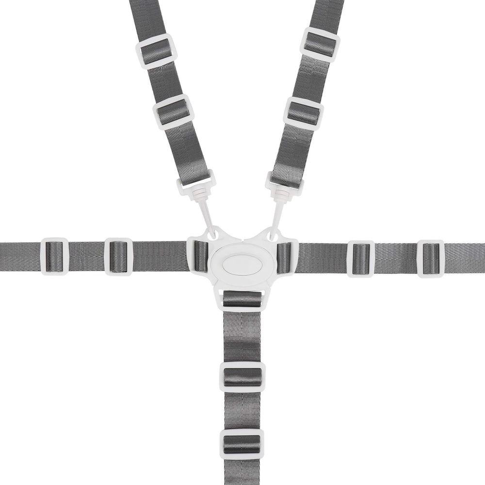 Minne Baby high-chair straps buckle close-up showcases secure fastening for safe feeding.