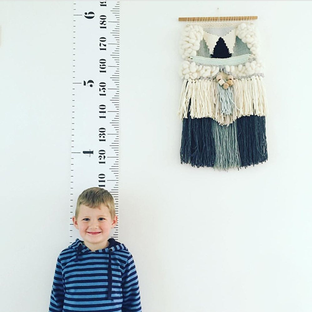 MinoMia marks horizontal lines to record milestones on family memories.