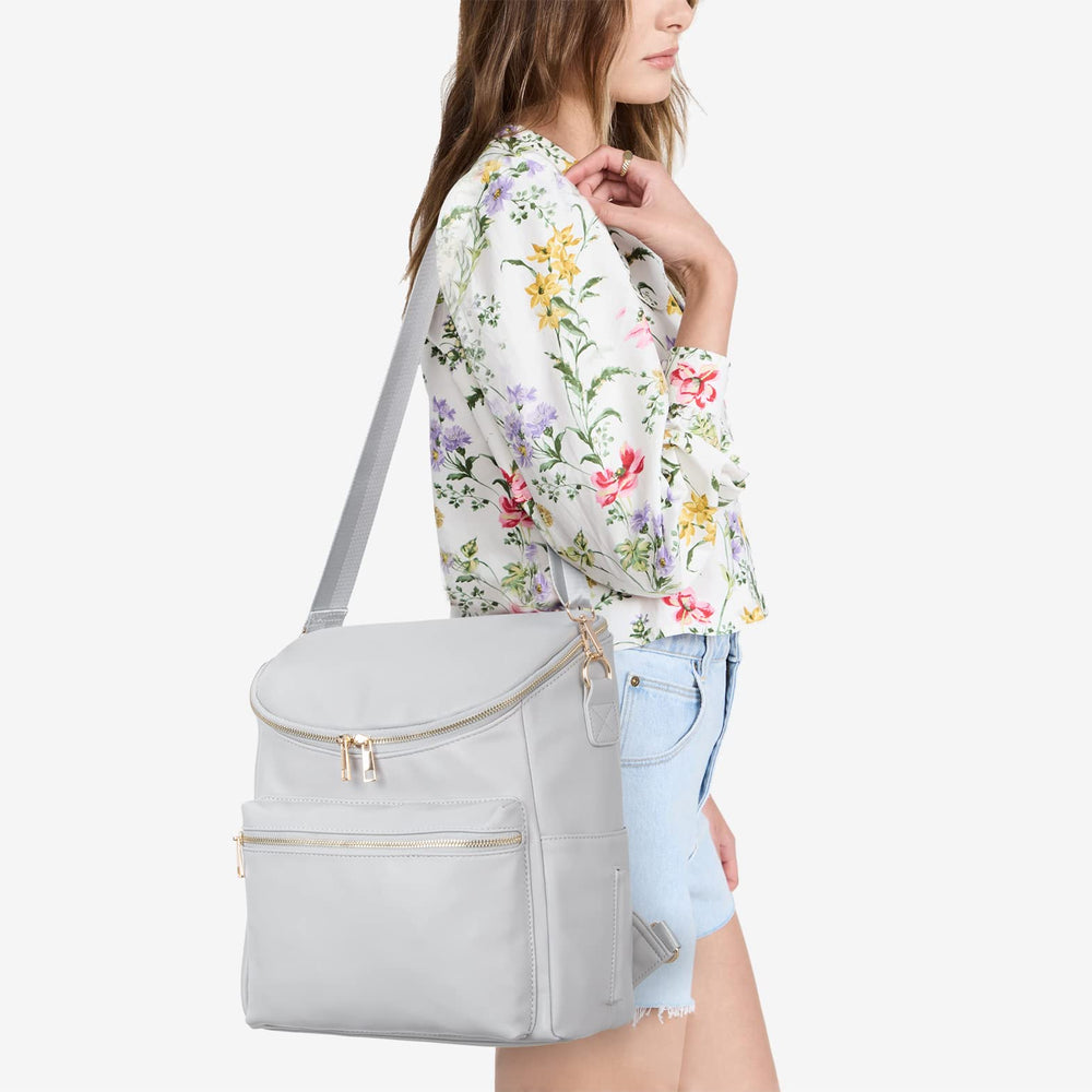 Minsong diaper bag backpack-stroller-straps secure on strollers for hands-free travel.