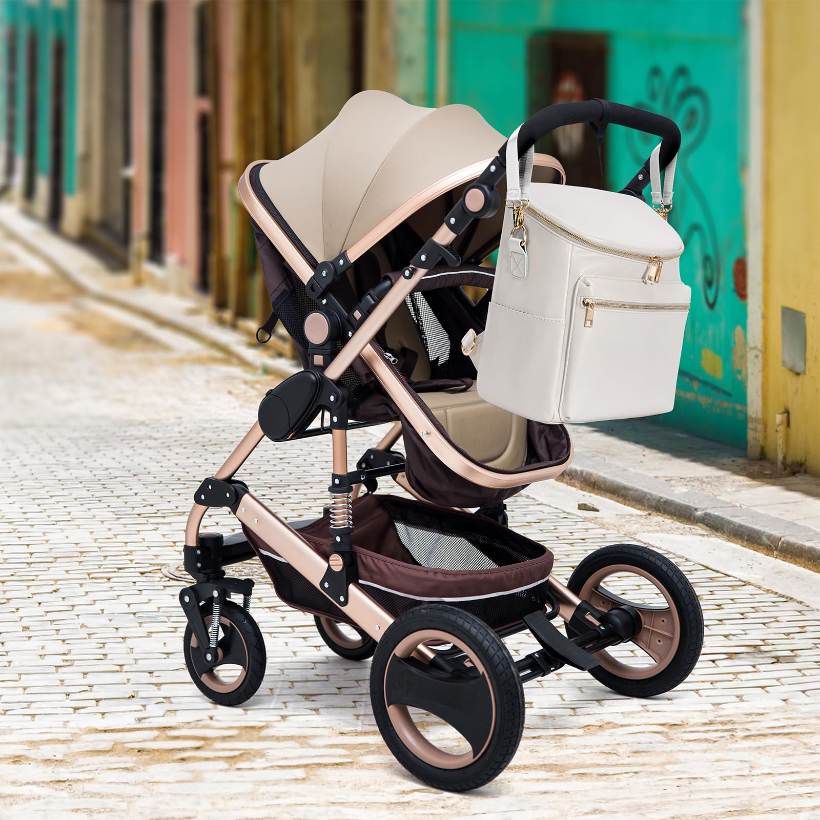 Minsong diaper bag backpack converts to shoulder bag with detachable strap.