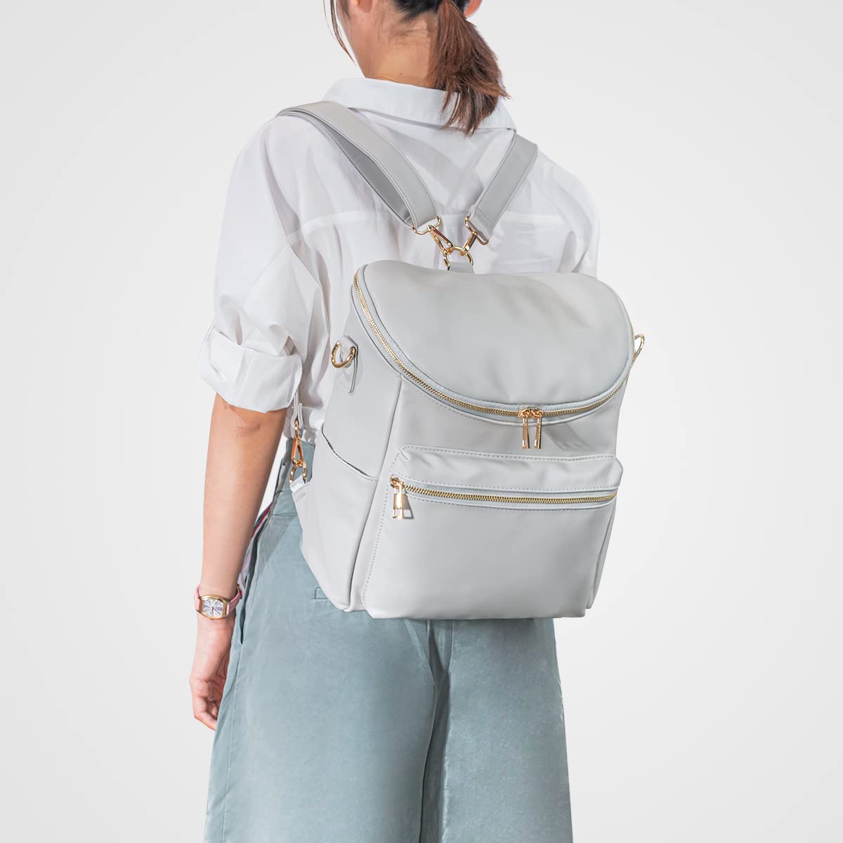 Minsong diaper bag backpack waterproof-pu-leather resists spills and wipes clean.