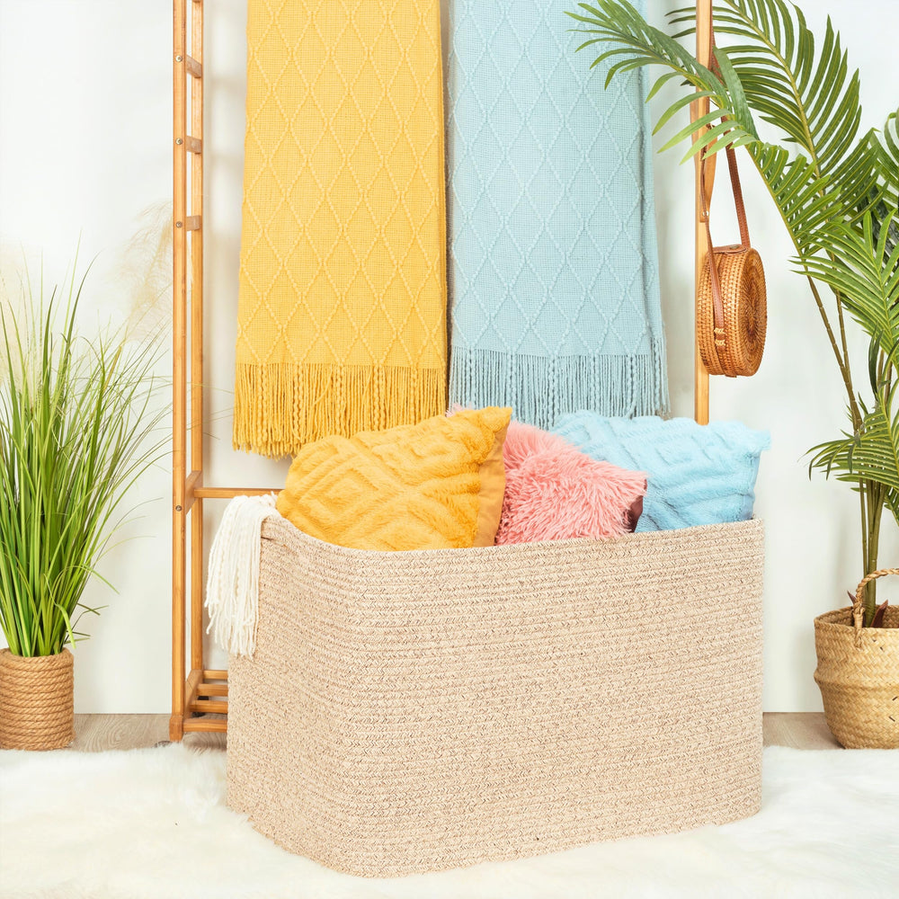 MINTWOOD Design basket with sturdy handles for easy transport of laundry or toys.
