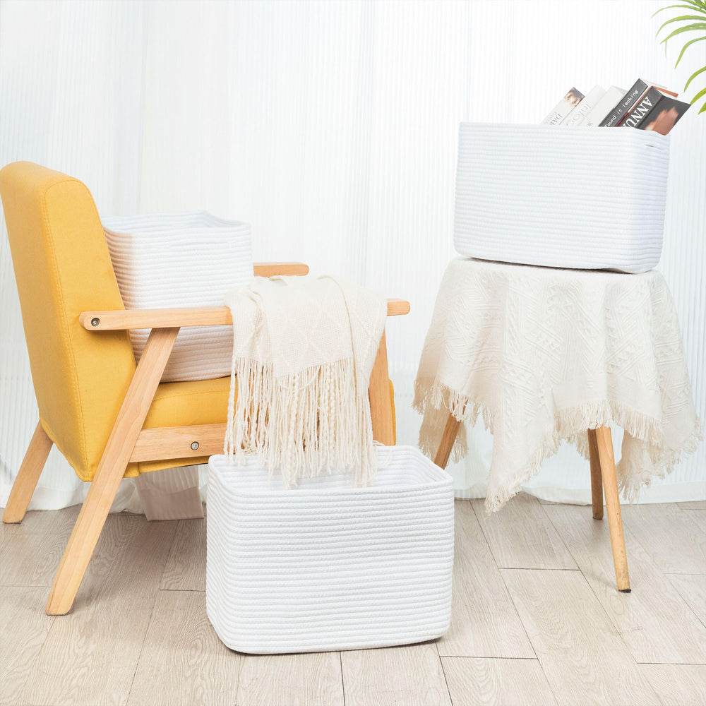 MINTWOOD Design bedside table setup with baskets for tidy essentials and decor.