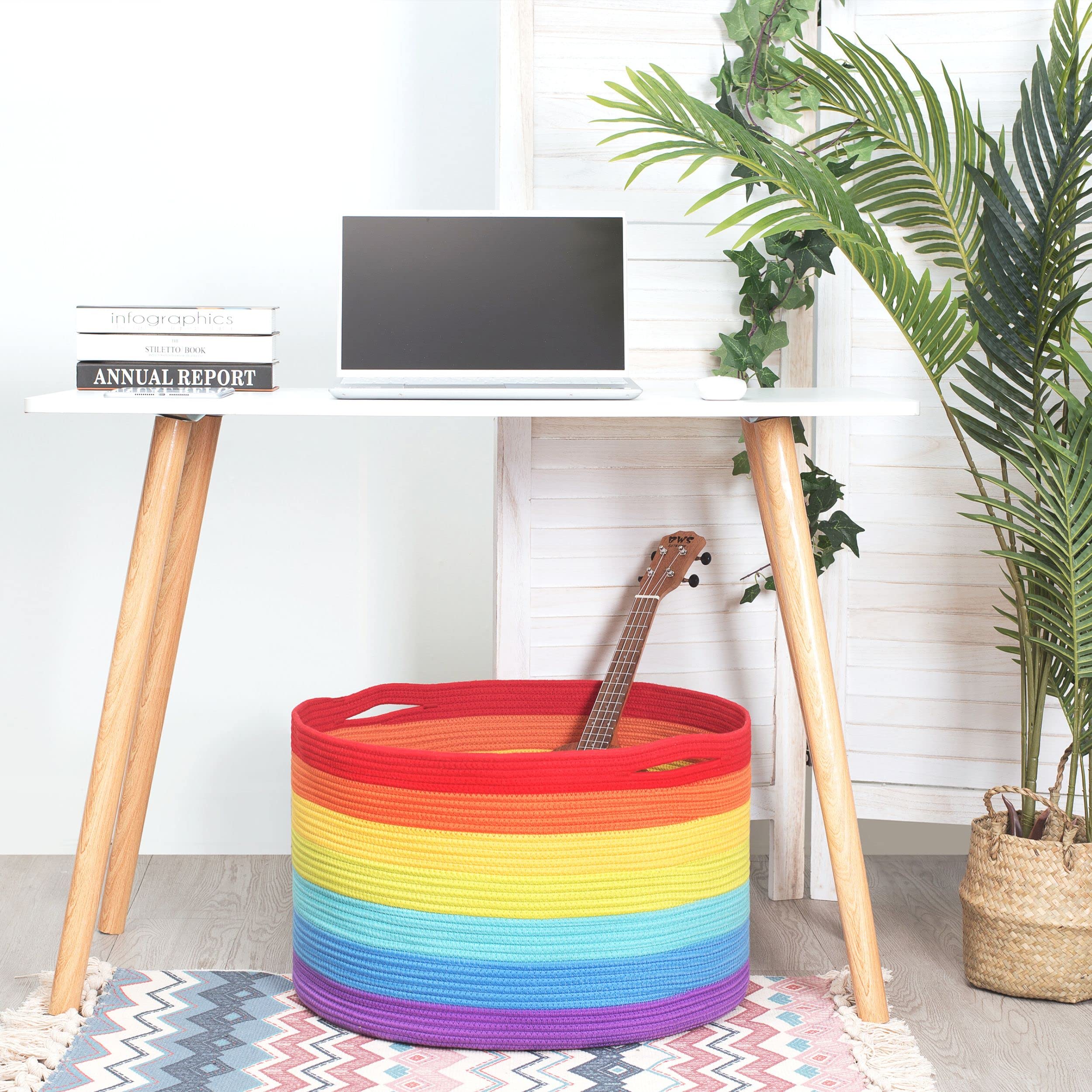 MINTWOOD Design rainbow basket in bedroom used for blankets and cushions