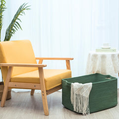 Mintwood Design rectangle rope storage basket holding towels in a living space