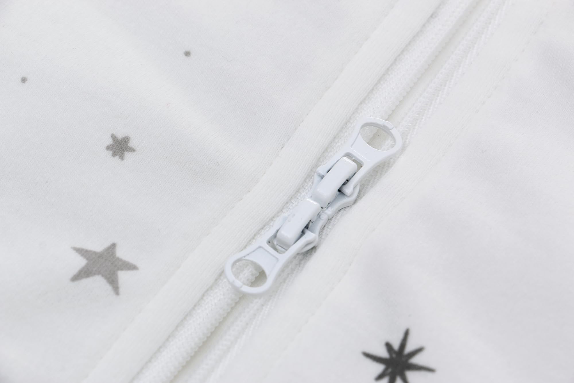 Miracle Baby Sleep Sack with two-way zipper eases safe dressing.