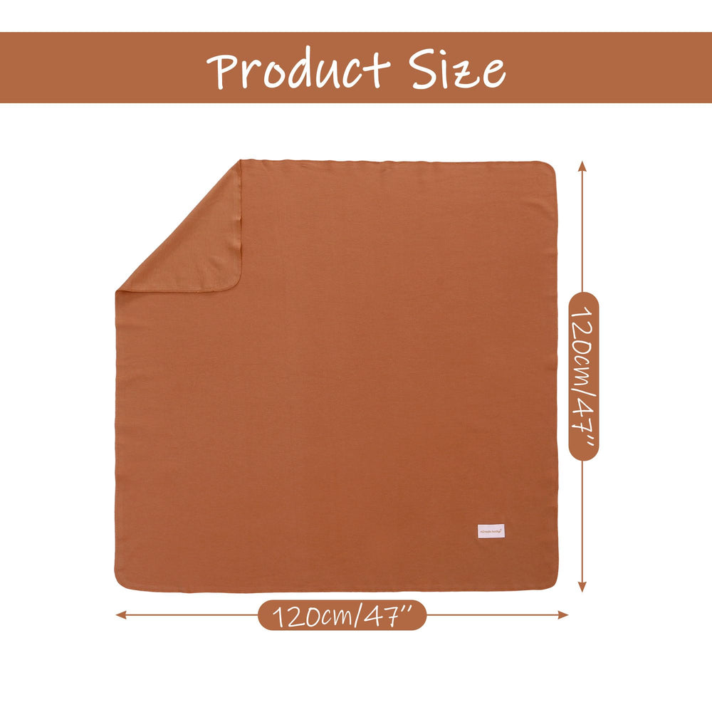 Miracle Baby swaddle blanket closeup shows soft cotton weave and gentle skin touch.
