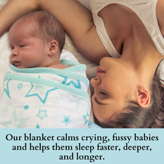 Miracle Blanket baby sleeping peacefully while swaddled for calm nights