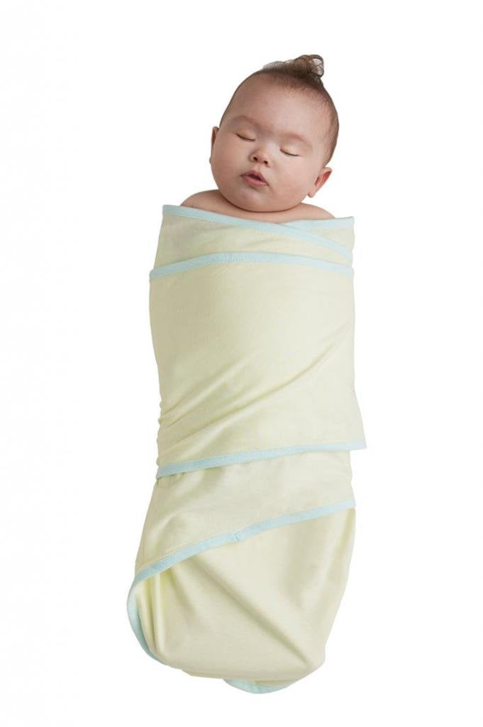 Miracle Blanket swaddle baby sleeping illustrates peaceful naps without fuss