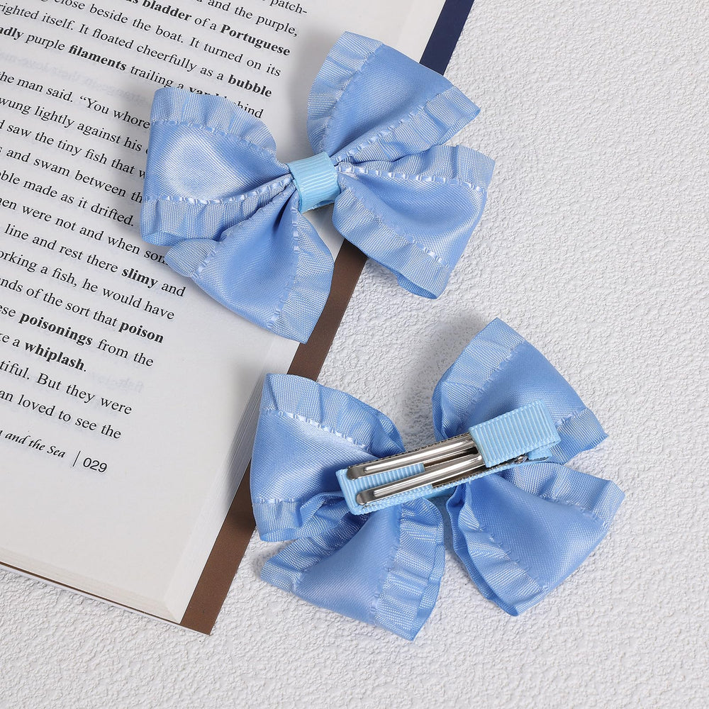 Miroksh antique blue satin bow clip in alligator style, perfect for ponytails.