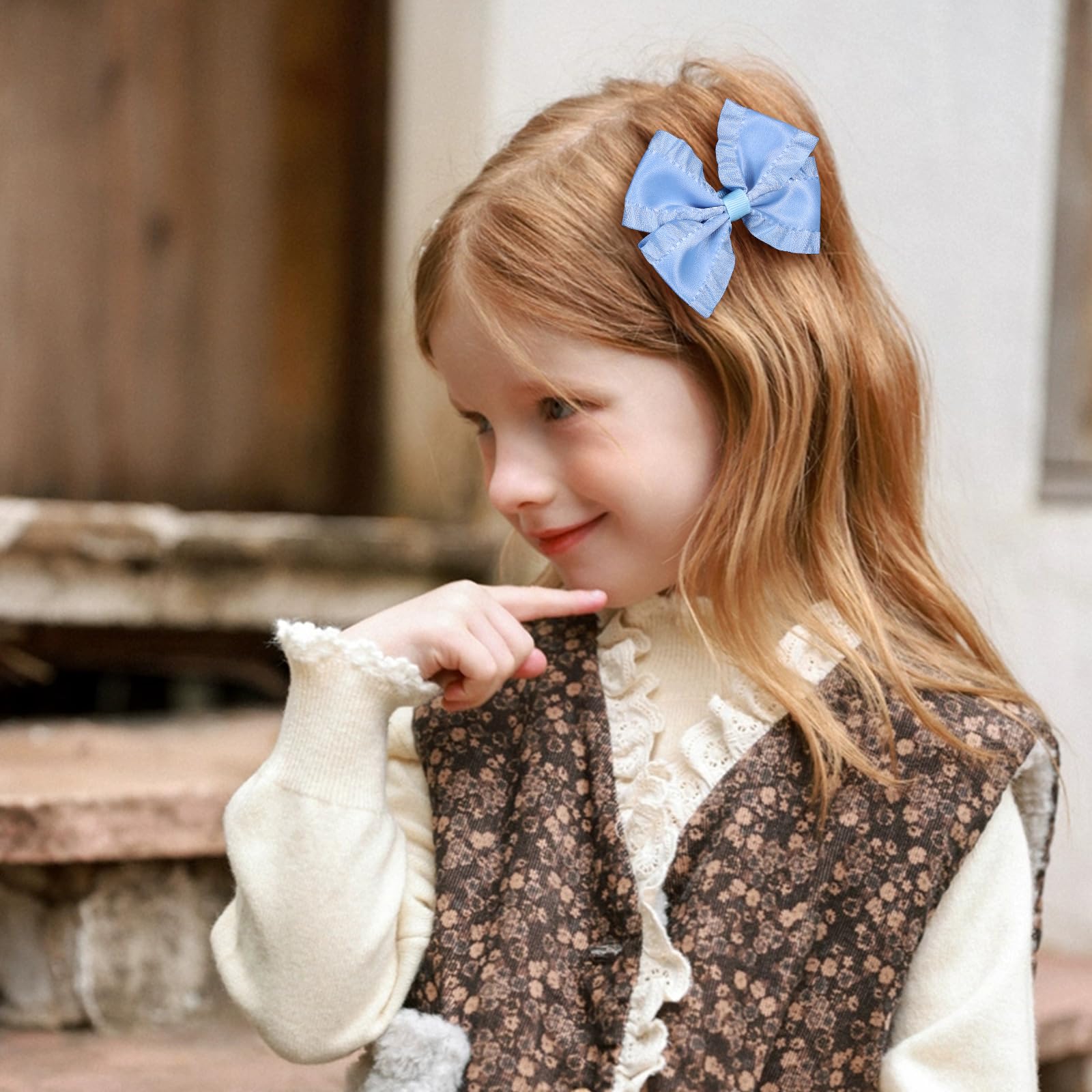 Miroksh antique blue bow clip adds cute touch to braids or pigtails.