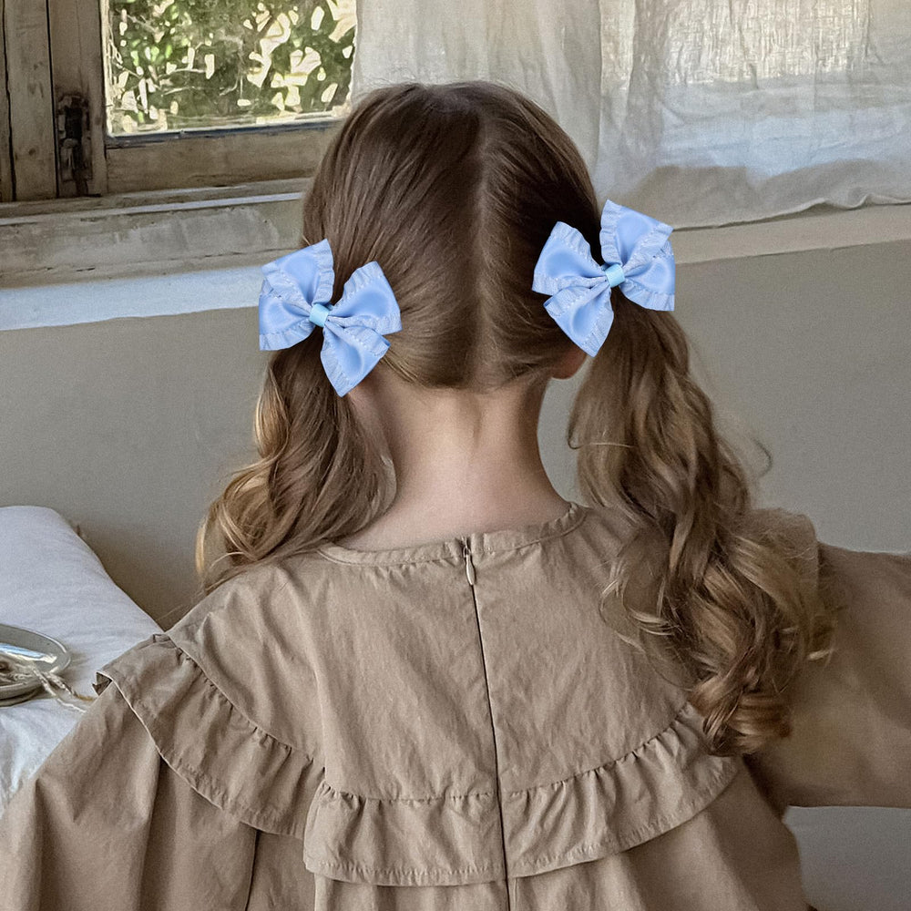 Miroksh antique blue satin bow clips set provides versatile daily wear.