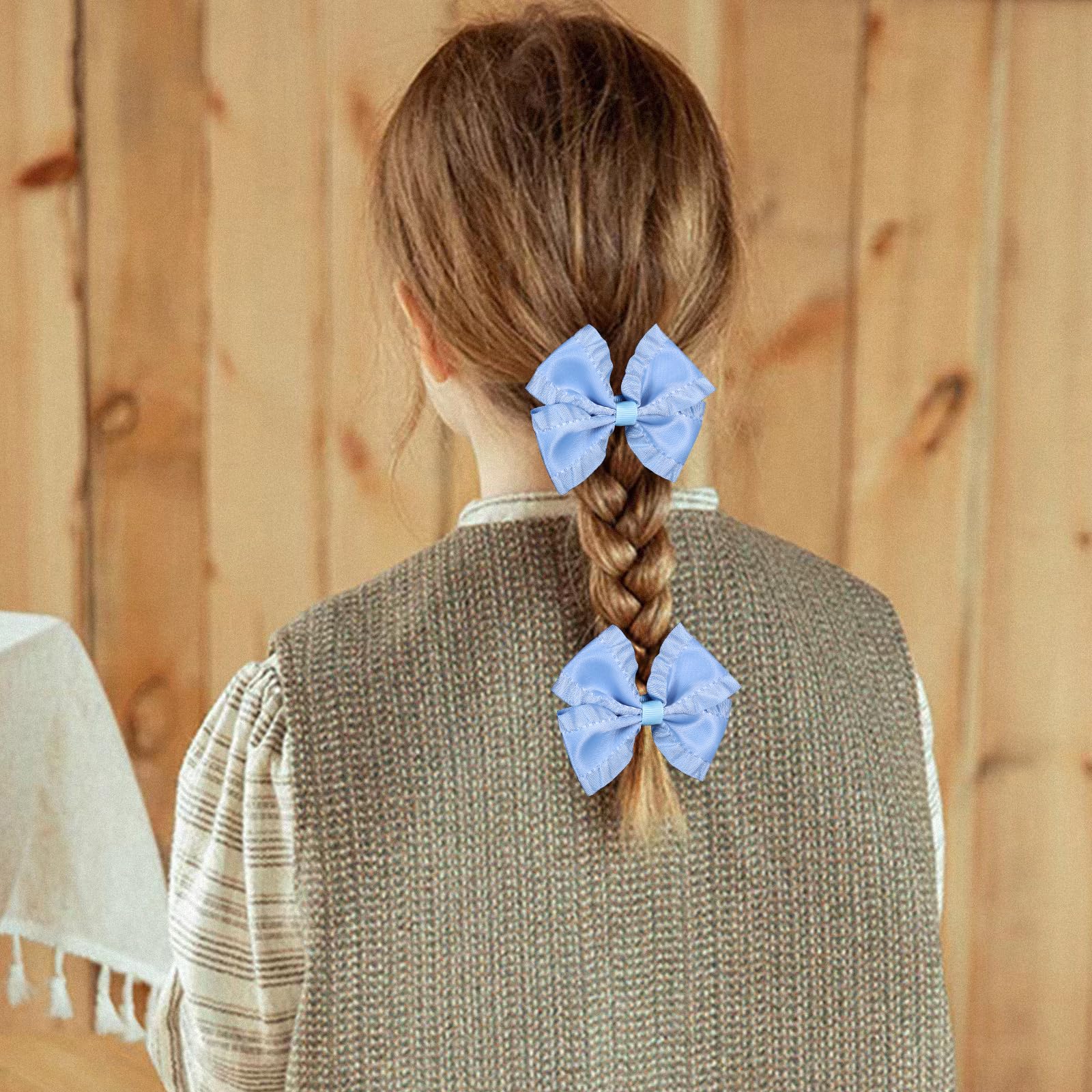 Miroksh ruffled satin bow clip glides easily into hair without pulling.