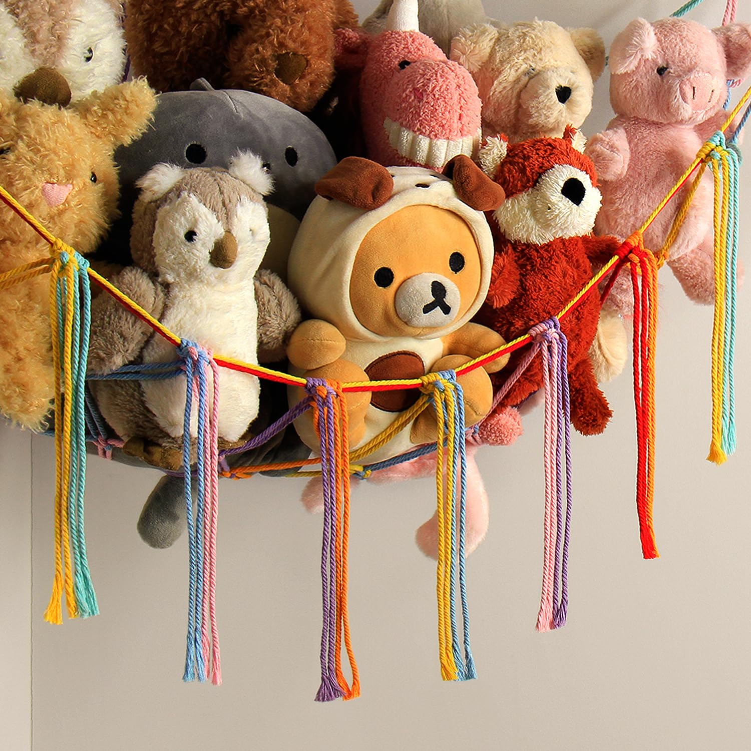 Mirolam toy hammock in a nursery shows practical, playful storage.