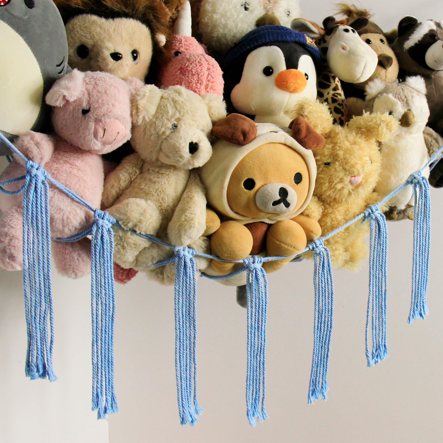 Mirolam corner-organizer-hanging-toy-net-blue keeps a mini zoo visible and reachable.