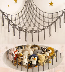 Mirolam stuffed animals hammock corner hanging neatly organizes plush toys in a kids' room.