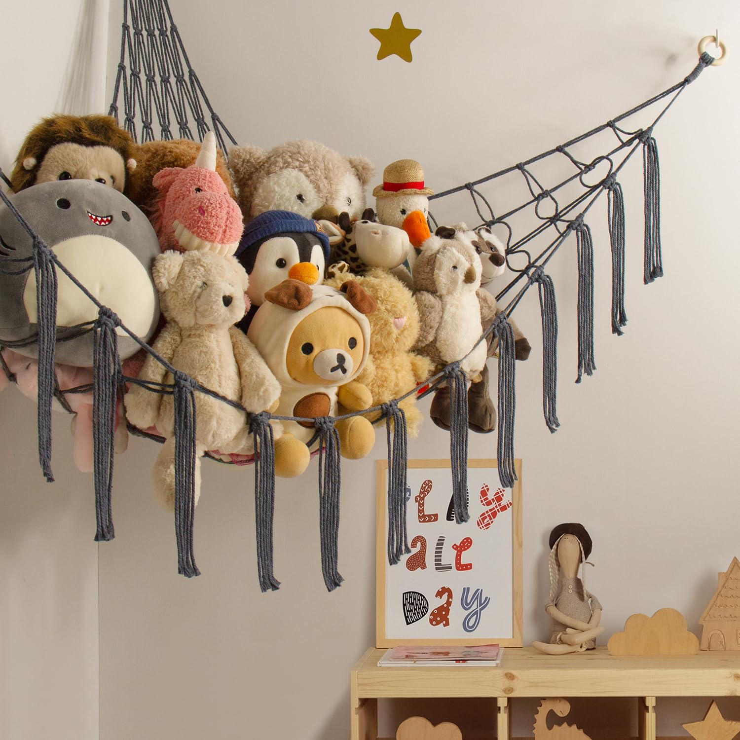 Mirolam toy hammock net setup in nursery demonstrates easy wall installation