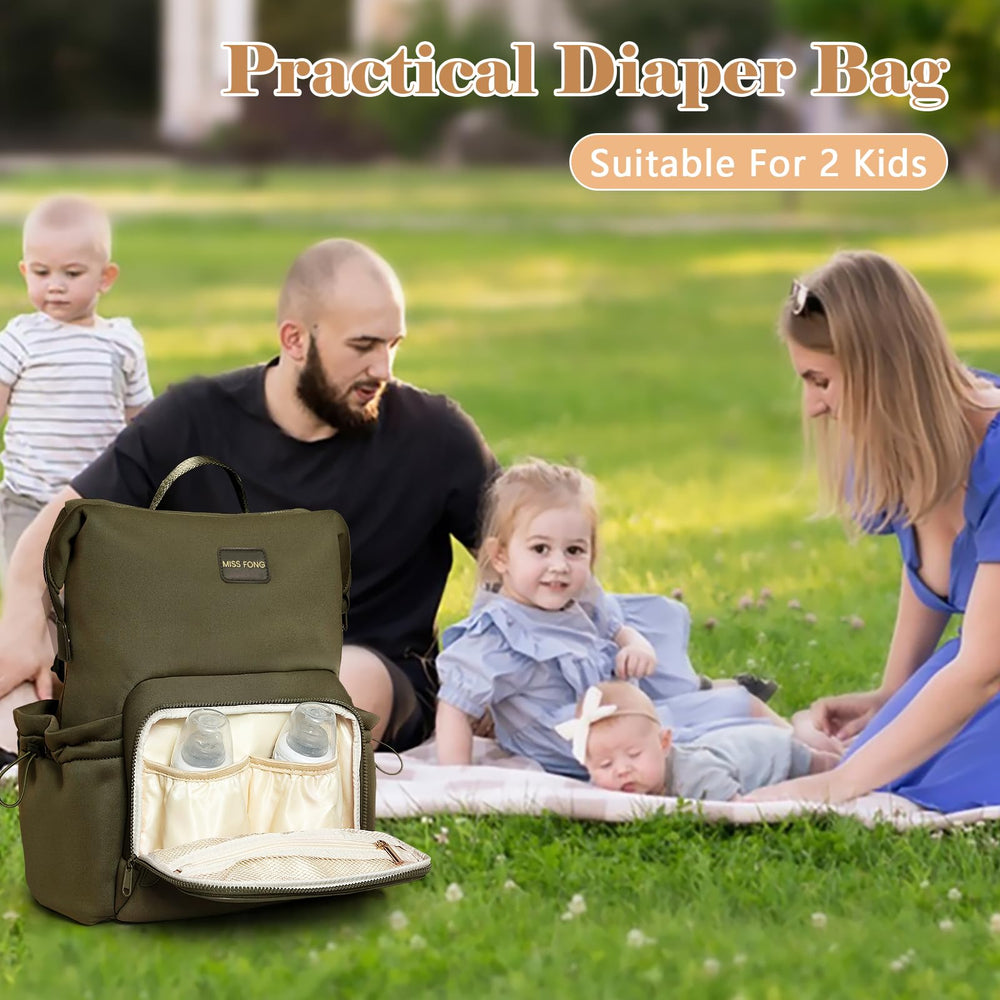 miss fong diaper bag backpack green main compartment keeps baby essentials neatly organized.