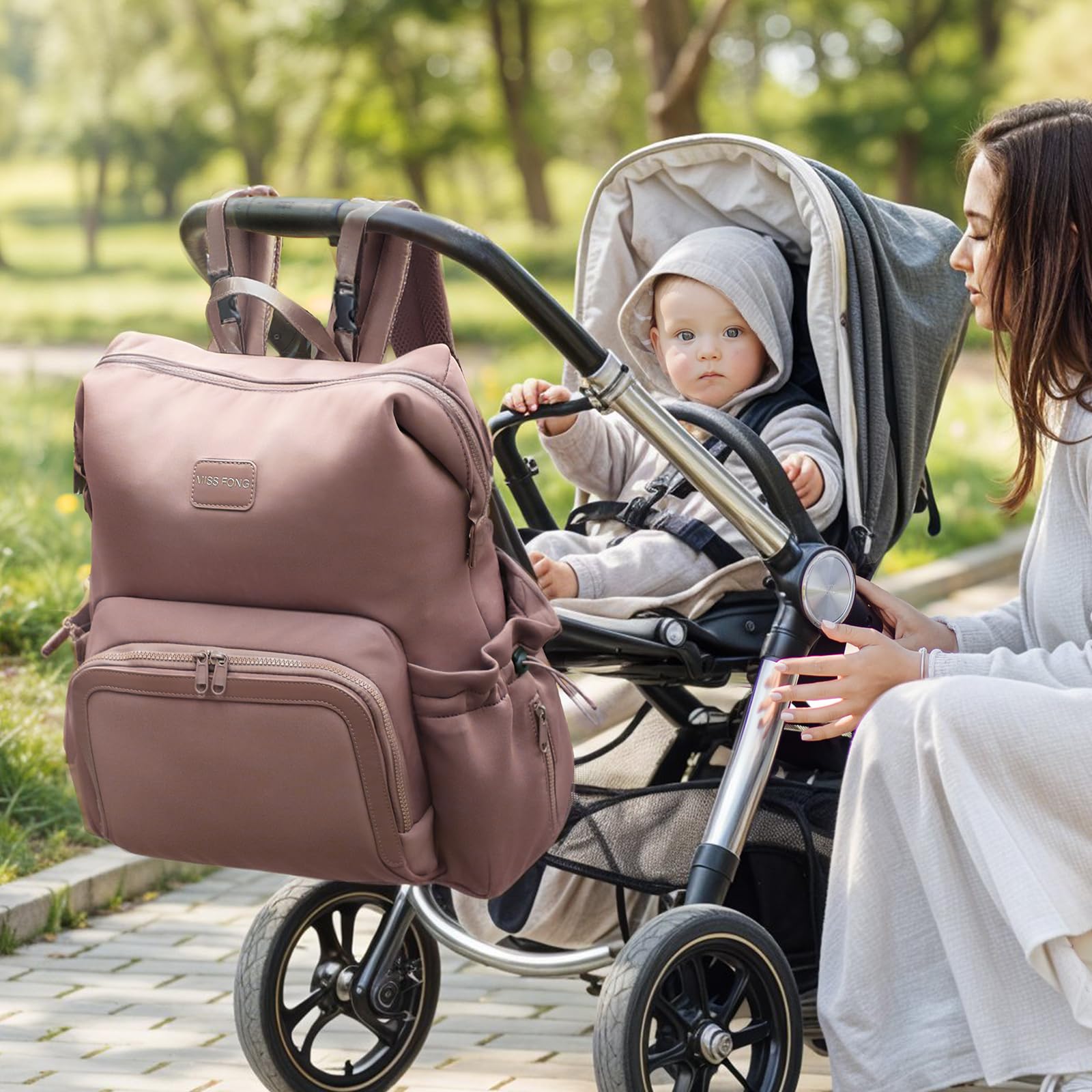 Miss Fong diaper bag backpack main compartment opened smoothly for easy item retrieval