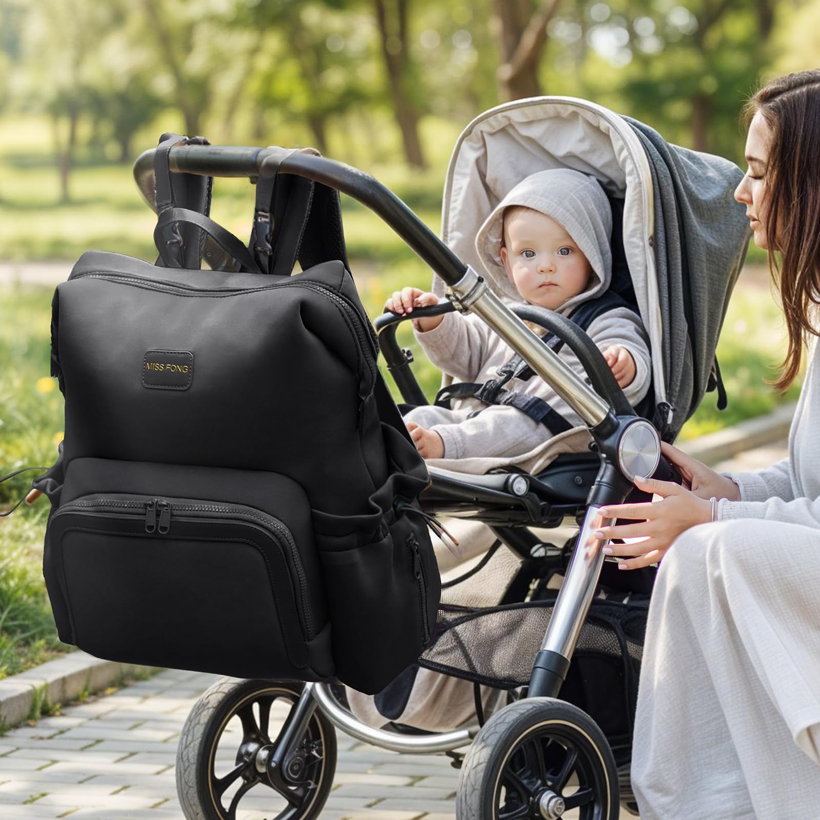 Miss Fong diaper bag backpack main compartment with smooth dual zippers.
