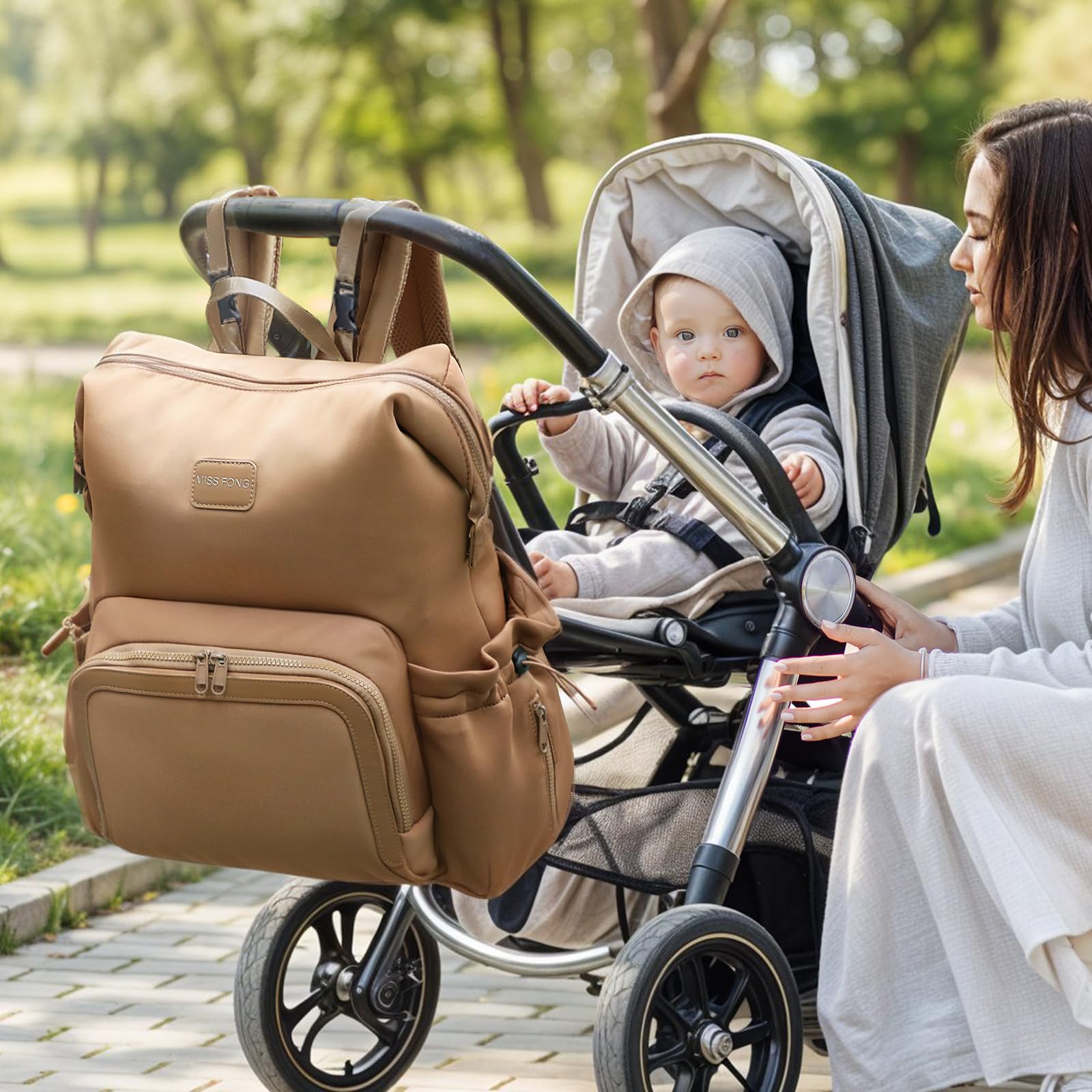 Miss Fong diaper bag backpack main compartment spacious for baby clothes and snacks every day.