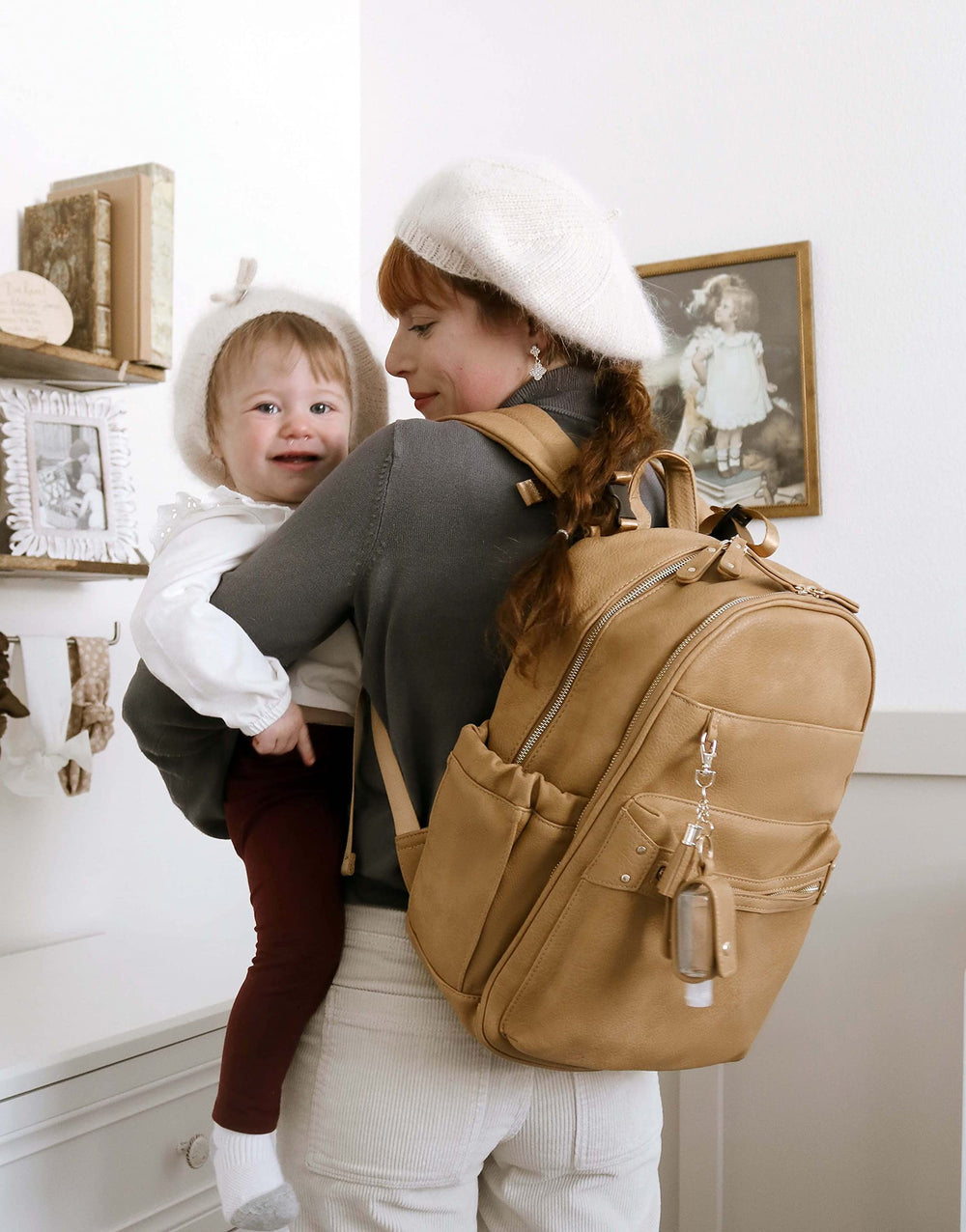 Miss Fong Leather Diaper Bag Peanut changing pad included for clean changes anywhere.