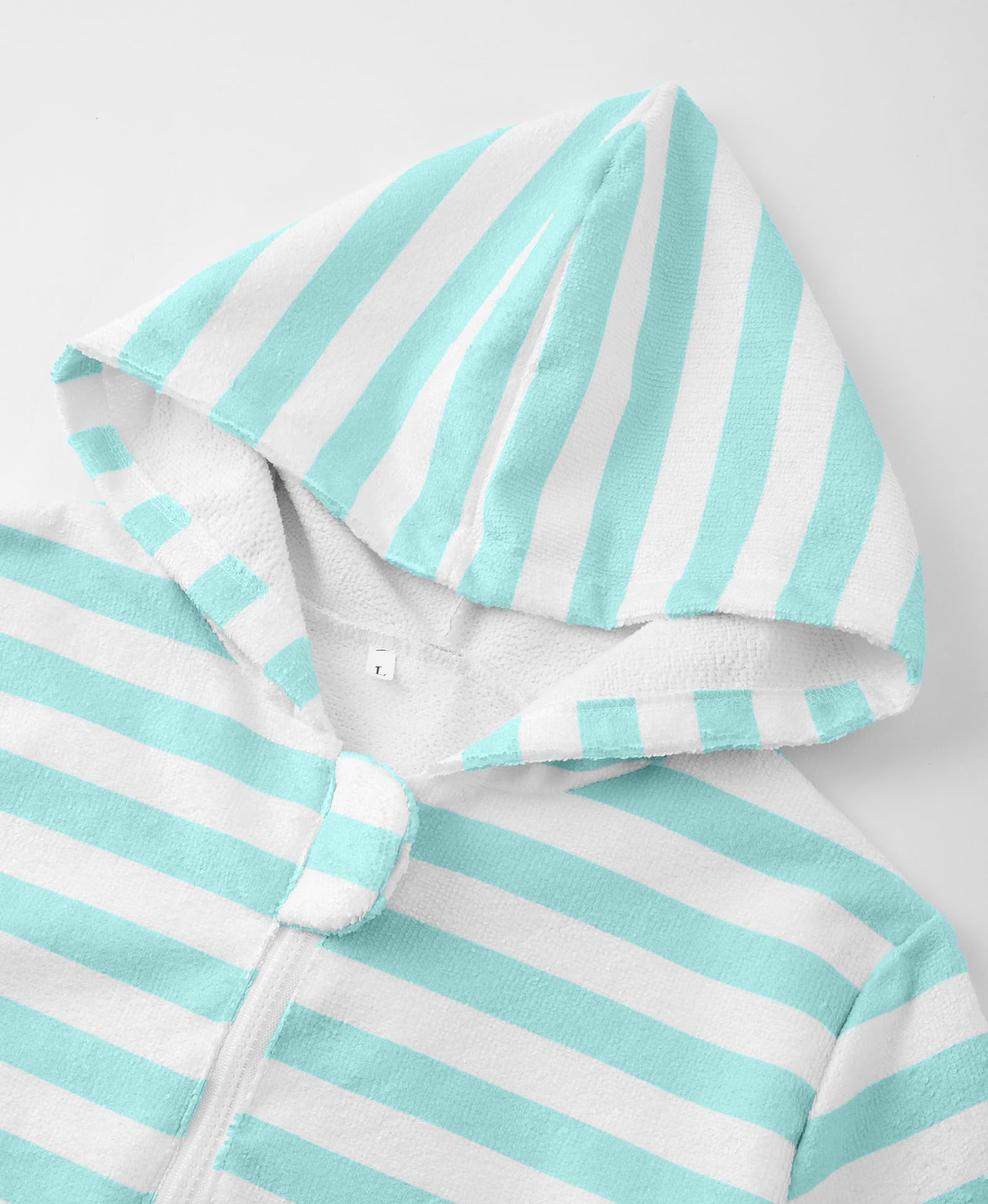 MissShorthair kids hooded towel poncho pocket detail highlights handy front pockets.