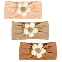 MIUXUESO beige baby flower headbands with soft elasticity for gentle newborn wear.