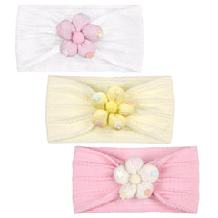 MIUXUESO beige flower headband—soft nylon for gentle all-day wear on babies