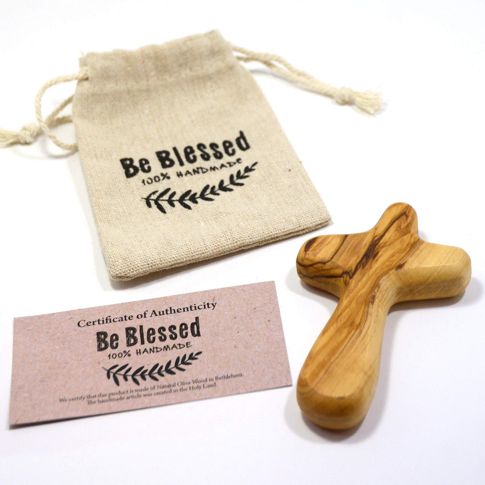 MIZZE hand-held clinging cross detail emphasizes ergonomic palm fit