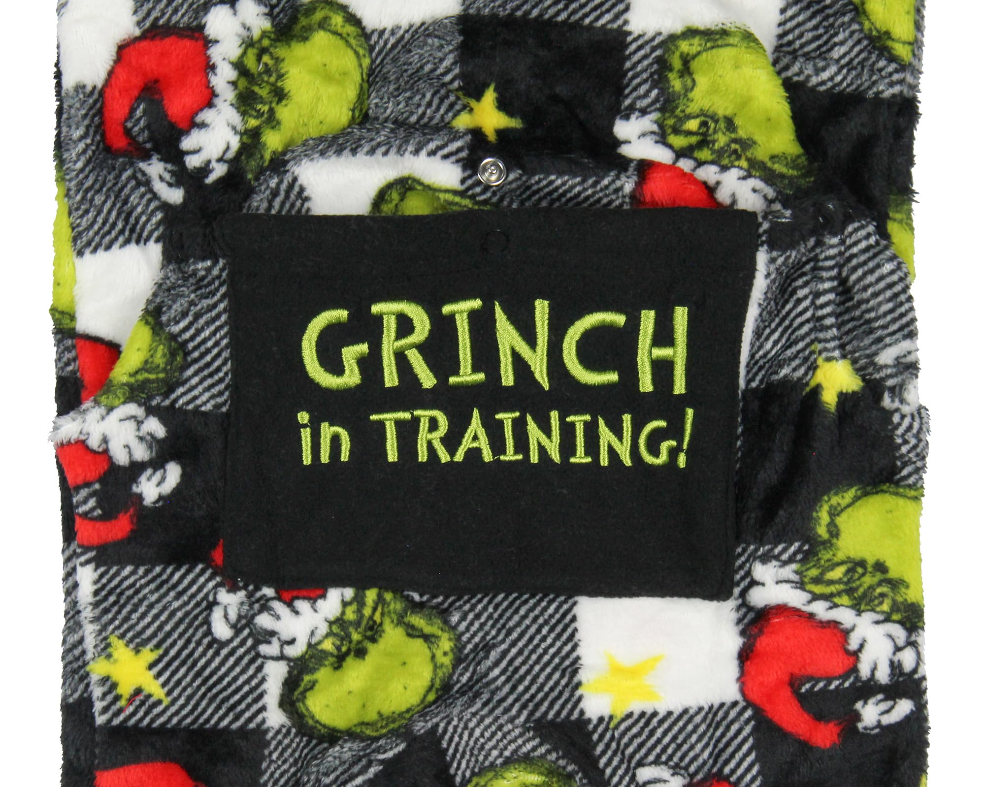 MJC Grinch footed pajama provides warm fleece coverage
