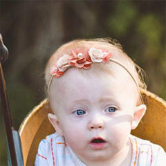 mligril elastic nylon headband closeup demonstrates soft, stretchable fabric for growing babies.