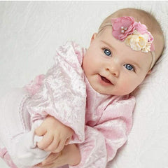 mligril floral headbands on baby photoshoot highlighting delicate design