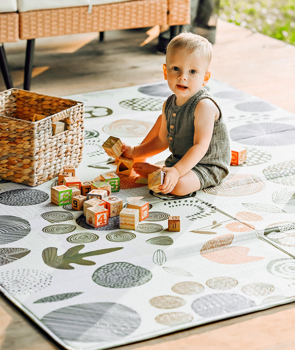 Mloong baby play mat expansive surface supports crawling exploration.