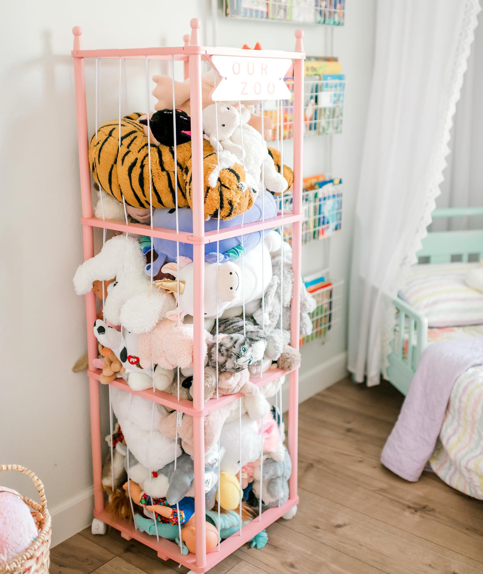 Mloong stuffed animal zoo storage pink-wood folded display demonstrating decorative functionality