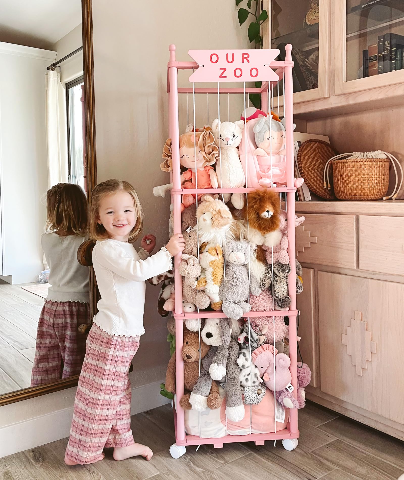 Mloong stuffed animal zoo storage pink-wood nursery decor in a cozy room