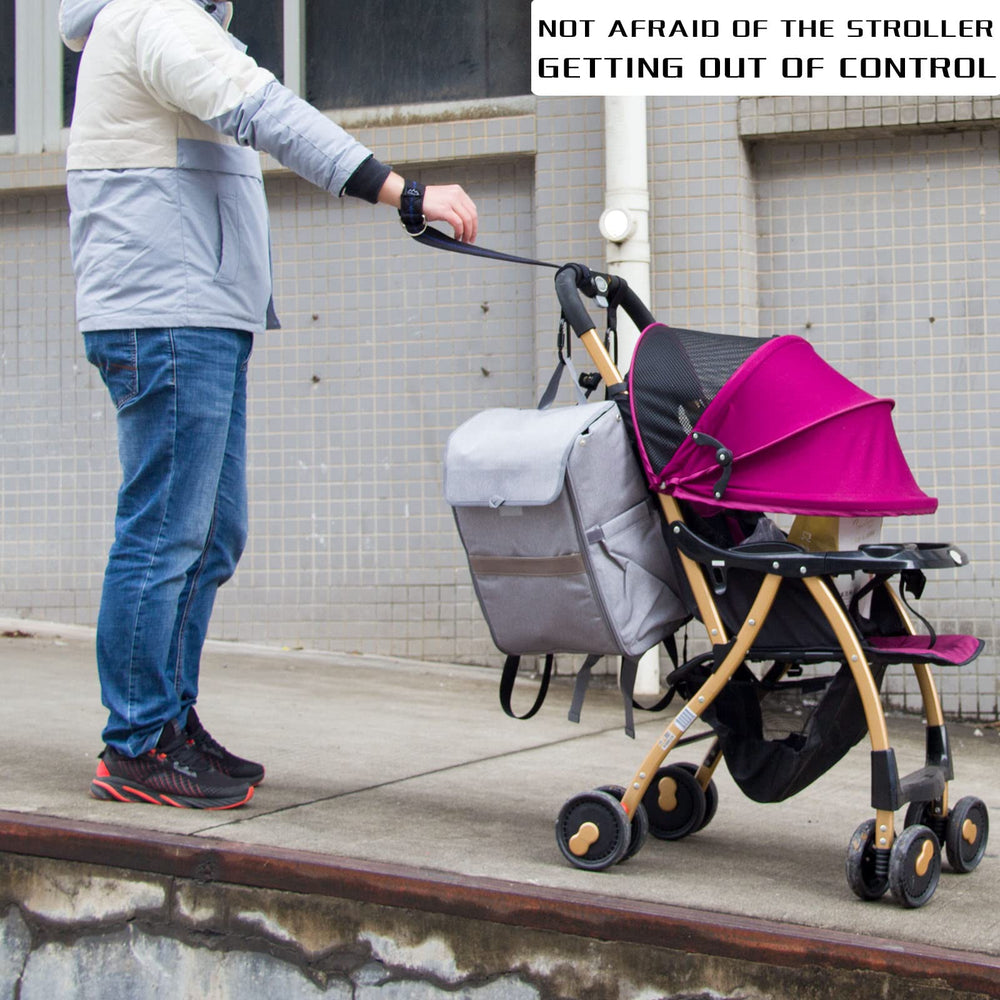 MoBearer stroller-safety-strap on the wrist for secure control on hills.