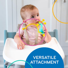 MÖBI Liinklz toy attachment demonstrated on high chair for secure connection.