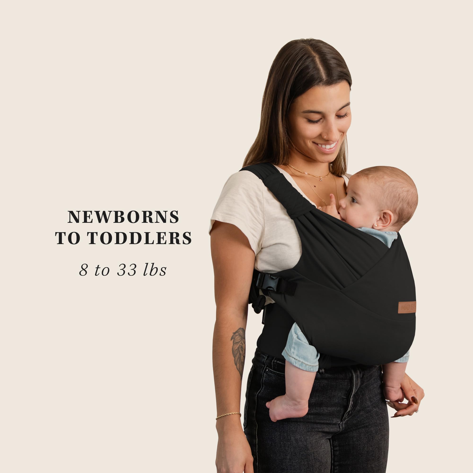 Moby Baby Duet quilted drool pads removable for easy cleaning.