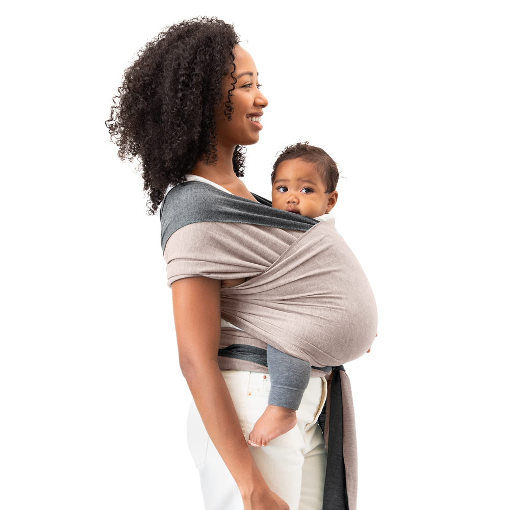 Moby Baby Wrap folded compactly to illustrate ultralight travel-ready design.