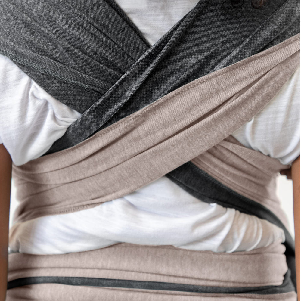 Moby Baby Wrap in Kangaroo Hold mode for easy transitions and active use.