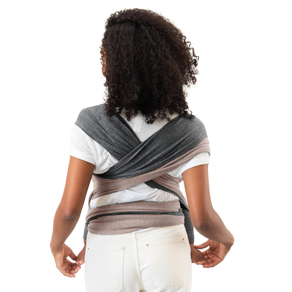 Moby Baby Wrap newborn hug demonstration with secure, snug fabric wrap.