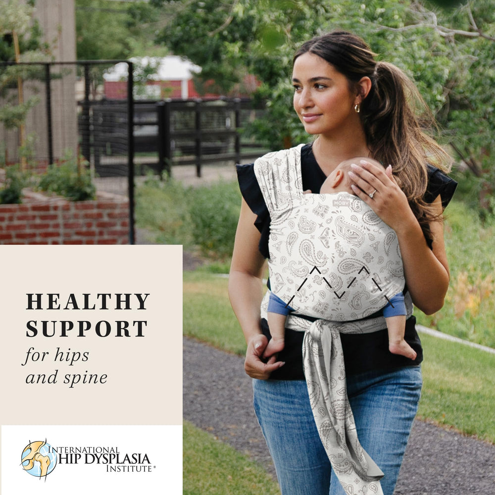 MOBY Bandana Wrap on shoulders illustrating even weight distribution across back and hips