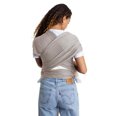 Moby Basics Wrap worn by a parent on the go demonstrating hands-free convenience.