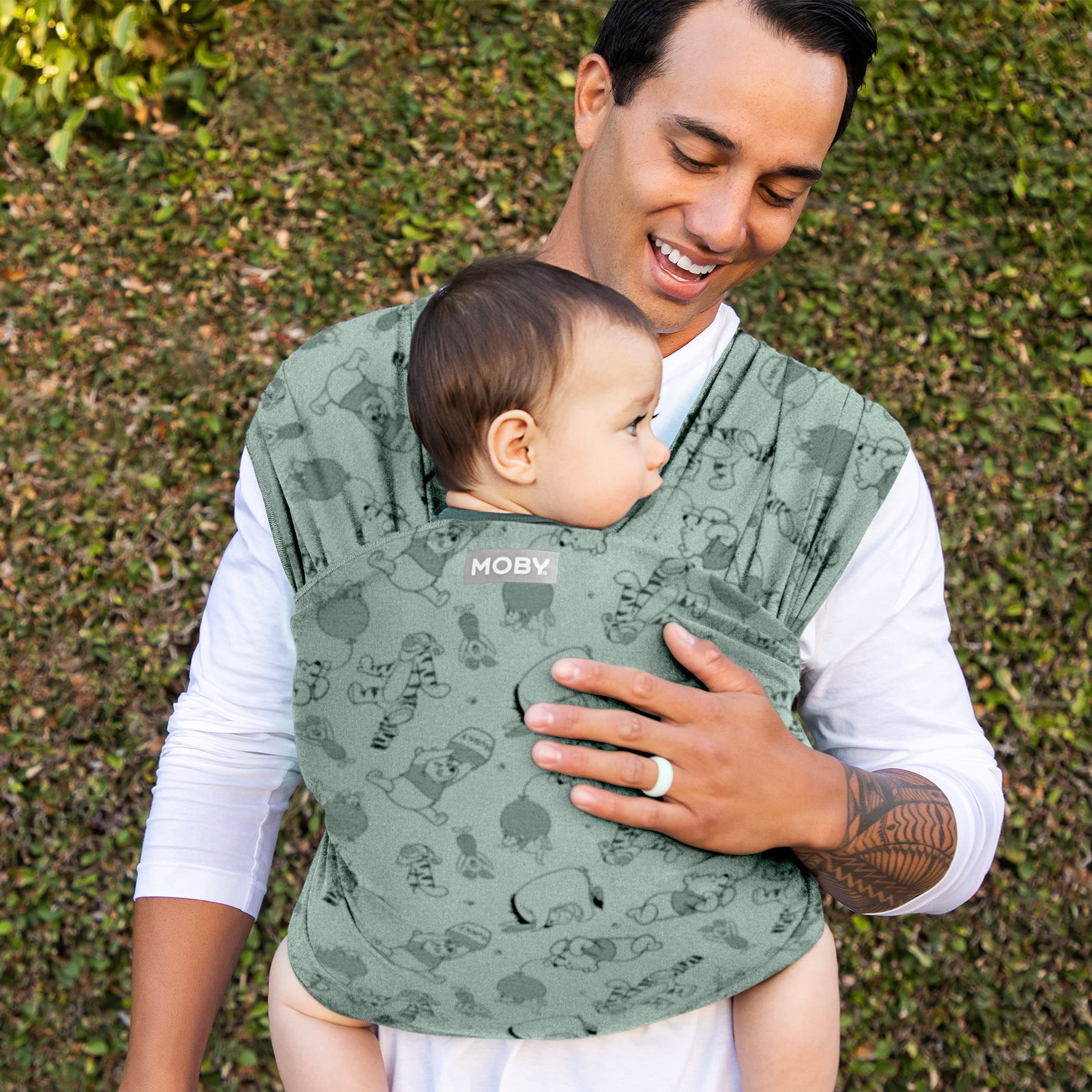 Moby Featherknit baby wrap folded as a soft blanket when not worn